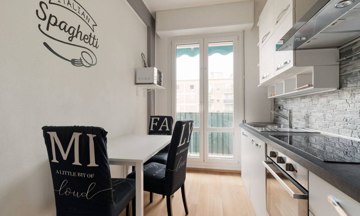 Milan Apartment | A cozy 70 sqm apartment, ideal for 4 people, located on the 4th floor of a building with an elevator.The property is situated in the Quartiere degli Olmi, a residential area in western Milan.Surrounded by expansive green spaces, the neighborhood offers a