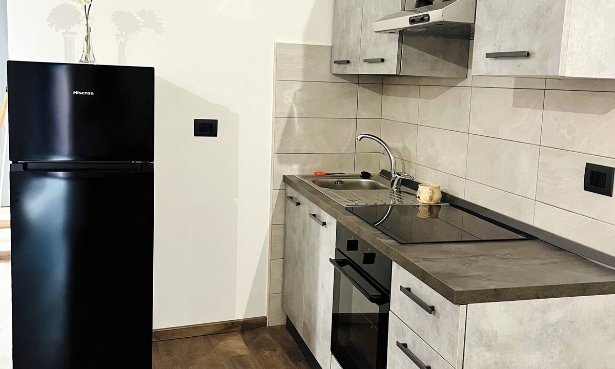 Piansano House | Alley house