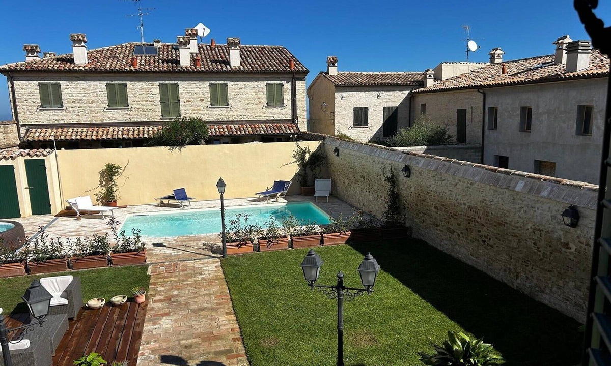 Pesaro Apartment | Apartment in a village with swimming pool