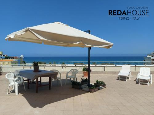 San Tommaso Tre Archi Apartment | Attico Fronte Mare Terrazza Panoramica BBQ e aria condizionata