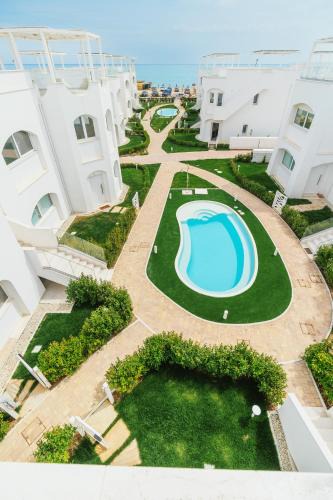 Marcelli Apartment | Azuleyos Garden & Pool fronte mare