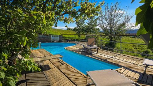San Giorgio Scarampi Villa | [Ca' del Cucco] Piscina privata tra le colline