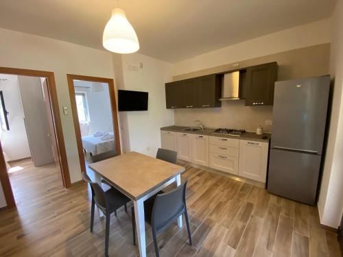 Chiesiola Apartment | Charming Apartment in Vieste with Shared Pool and Garden