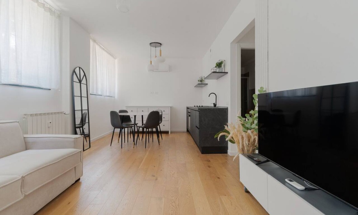 Milan Apartment | Cozy 41m2 apartment, ideal for 4 people, located in the basement (stairs to access).The accommodation is located in the Harar district, an architectural project designed to respond to post-war housing needs, structured around large green areas and thanks