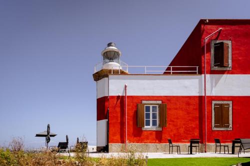 Isola del Giglio Resort | Faro di Punta Fenaio - Caletta Privata