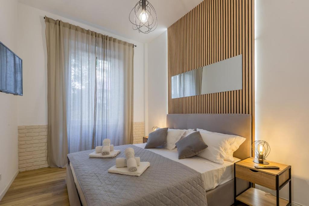Nomentano Apartment | Imperium House - appartamento con giardino privato, 3 minuti da Metro Piazza Bologna, A-C,