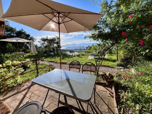 Monteluiano House | Ina Maka - Appartamento con giardino immerso nel verde