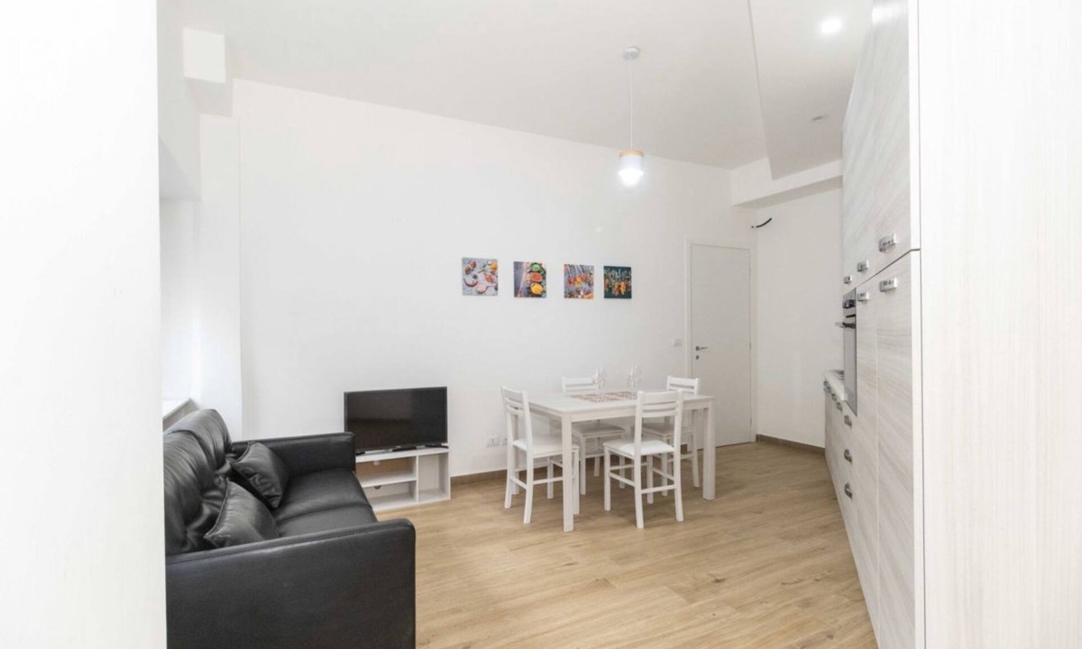 Vittoria Apartment | Modern 70 m2 apartment located on the mezzanine floor of an elegant condominium, a stone's throw from Piazza Statuto, in an ideal position for being able to move around the city comfortably.The Principi D'Acaja subway stop is 1 km away, the Porta Susa