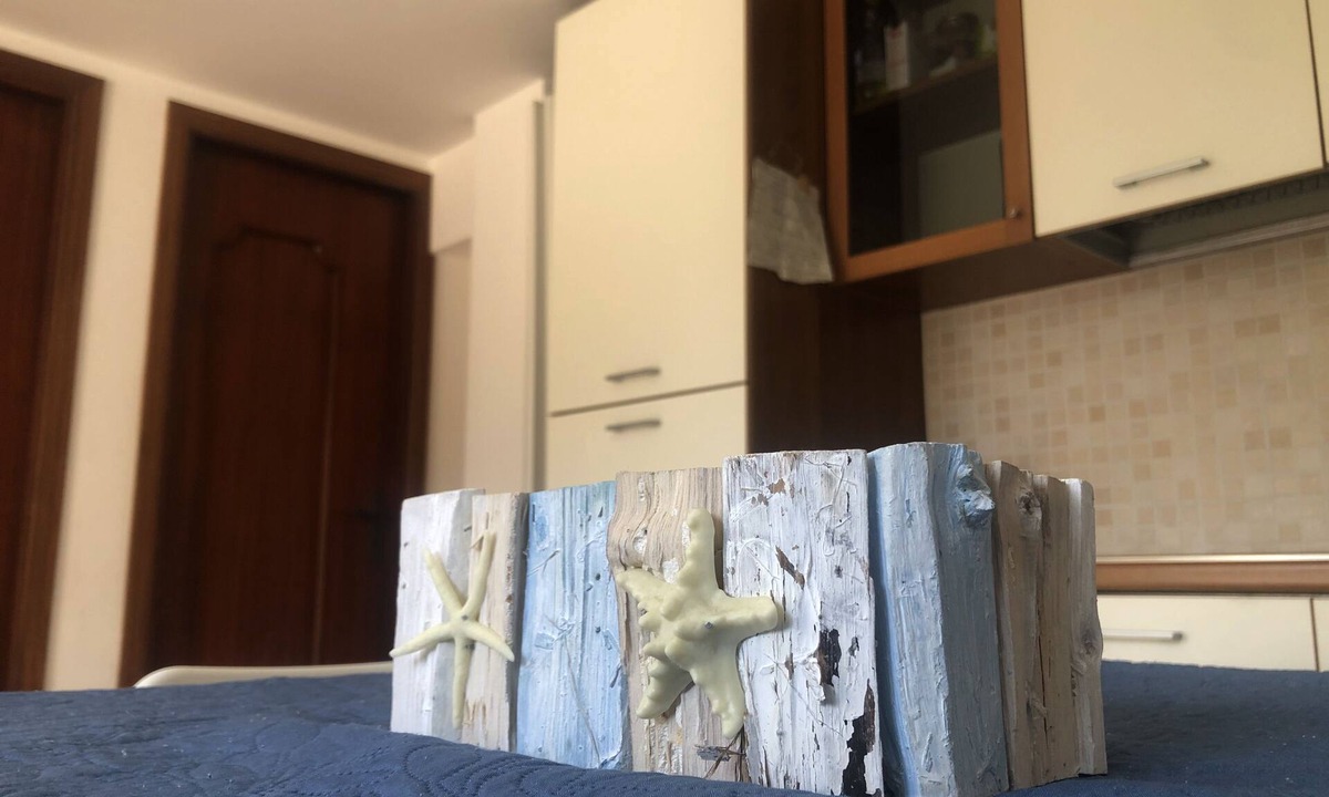 Praia a Mare Apartment | Nice one bedroom apartment with garden and parking space 1.5 km from the sea