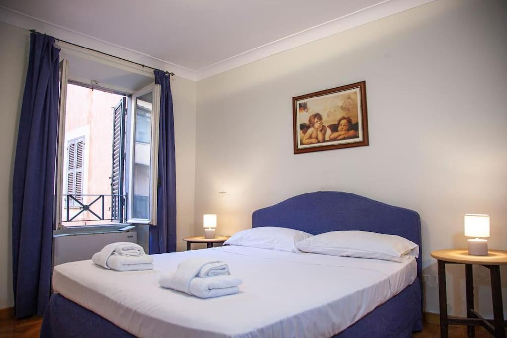 Rione XI Sant'Angelo Apartment | Peaceful apartment in piazza Venezia's alleys