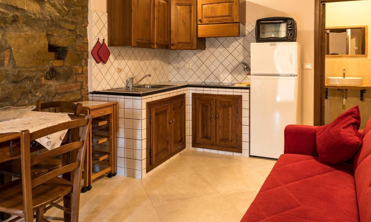 Le Piazze Other | Pietre flat with double bedroom and living room with sofa bed