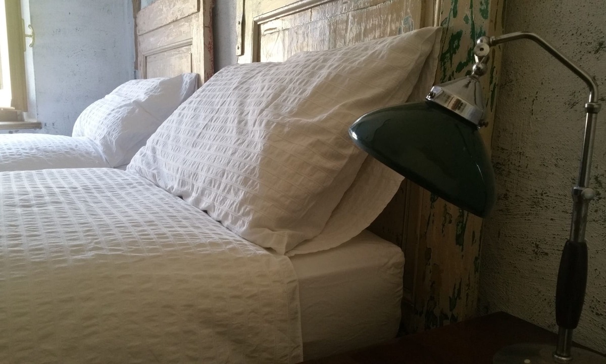 Passerano Marmorito House | Room with bathroom and hallway, 2 beds