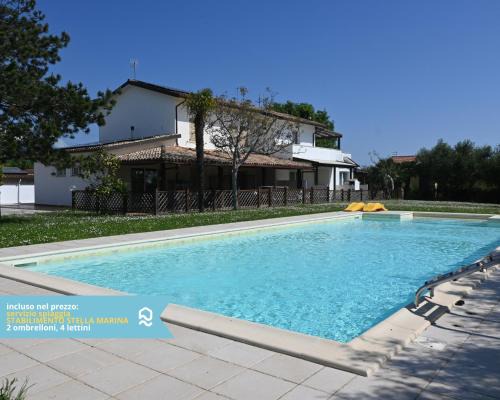 Villaggio Taunus Apartment | VIVA2 - Numana, quadrilocale in villa con piscina