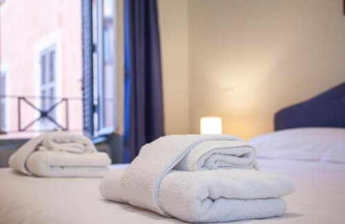 Rione XI Sant'Angelo Apartment | Peaceful apartment in piazza Venezia's alleys