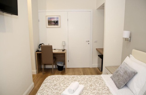 Vatican House | Vatican Comfort Suites