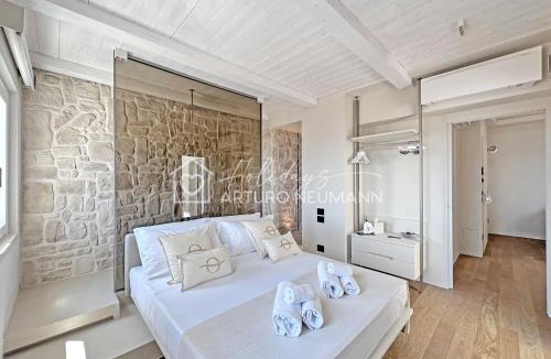 Numana Apartment | 301 - MARENOSTRUM COSTARELLA LUXURY SUITES - SUITE - SPIAGGIA E NAVETTA PRIVATA AL WHITE BEACH OMAGGIO dal lun al ven fino al 2 agosto
