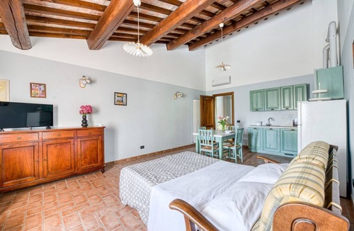 San Martino in Campo Apartment | A charming 65 sqm apartment, ideal for four people, located on the first floor of a building without an elevator.The apartment is located in a charming Umbrian-style farmhouse, with ample green space, relaxation areas, and a shared swimming pool. Its loc