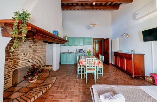San Martino in Campo Apartment | A cozy 65 sq m apartment, located on the first floor of a building without an elevator, can accommodate up to 4 people.The property is located within a characteristic Umbrian-Tuscan farmhouse, featuring a large garden, relaxation areas, and a shared swim