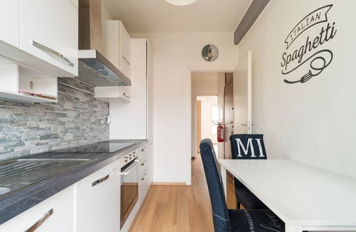 Milan Apartment | A cozy 70 sqm apartment, ideal for 4 people, located on the 4th floor of a building with an elevator.The property is situated in the Quartiere degli Olmi, a residential area in western Milan.Surrounded by expansive green spaces, the neighborhood offers a