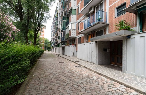 Milan Apartment | A cozy 70 sqm apartment, ideal for 4 people, located on the 4th floor of a building with an elevator.The property is situated in the Quartiere degli Olmi, a residential area in western Milan.Surrounded by expansive green spaces, the neighborhood offers a