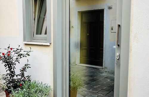 Piansano House | Alley house