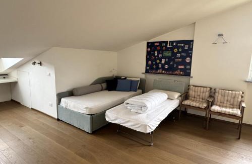 Fubine Apartment | Ampio Appartamento con vista lago, sauna e camino Golf club Margara
