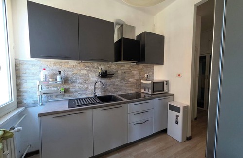San Paolo Apartment | An elegant and contemporary oasis nestled in the greenery of Ruffini Park; pets are welcome.