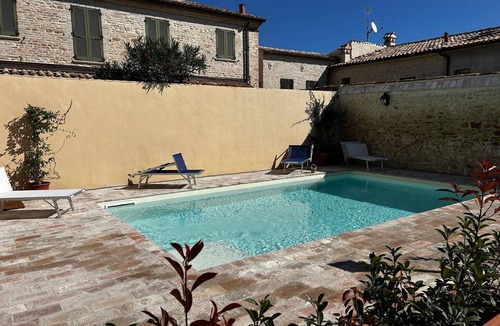 Pesaro Apartment | Apartment in a village with swimming pool