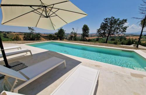 Belvedere Ostrense Apartment | Apartment Neue Wohnung mit 2 Zimmern- Veranda und Pool by Interhome