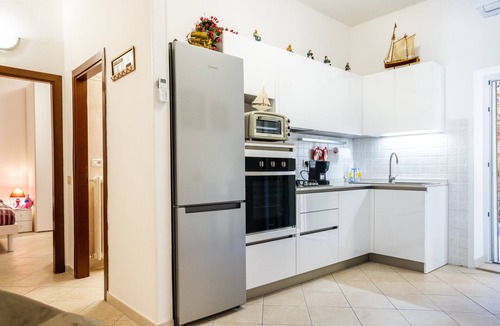 Porto Santo Stefano Apartment | Apartment 'Onda D'Argento' with Private Terrace and Air Conditioning