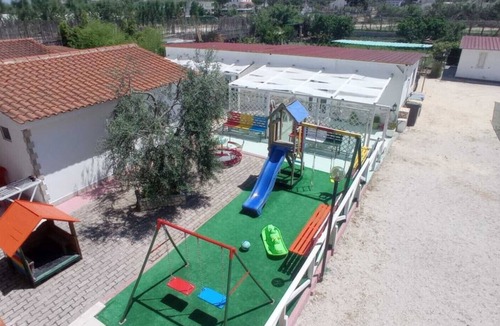 Peschici Apartment | Apartment 'Trilo 1' with Private Terrace, Shared Garden and Wi-Fi