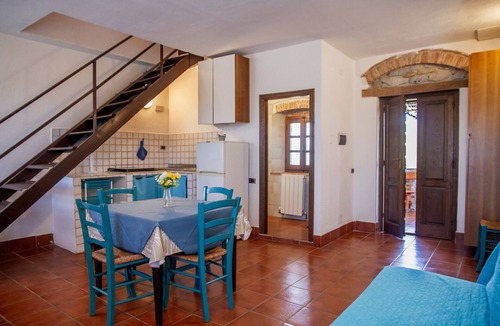 Gavorrano Apartment | Apartment 'Vecchio Molino - 5' with Shared Terrace, Shared Garden and Wi-Fi