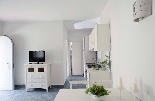 Villammare Apartment | Apartment with terrace. Shared pool. 150 metres from beach