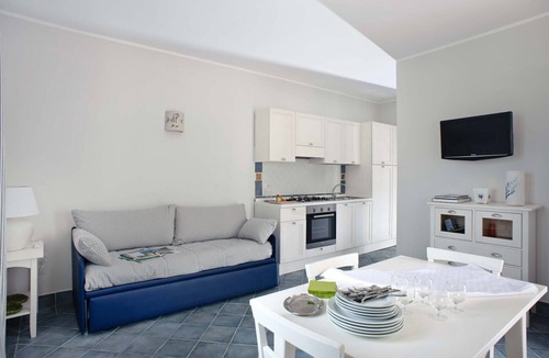 Villammare Apartment | Apartment with terrace. Shared pool. 150 metres from beach