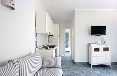 Villammare Apartment | Apartment with terrace. Shared pool. 150 metres from beach