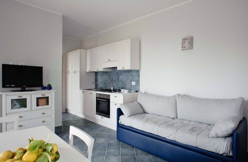 Villammare Apartment | Apartment with terrace. Shared pool. 150 metres from beach