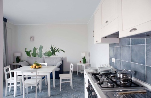 Villammare Apartment | Apartment with terrace. Shared pool. 150 metres from beach