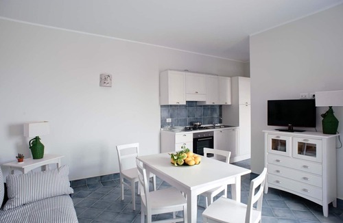 Villammare Apartment | Apartment with terrace. Shared pool. 150 metres from beach