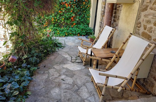 Scarlino Apartment | Artist's House Plus, sea view garden and original artwork.