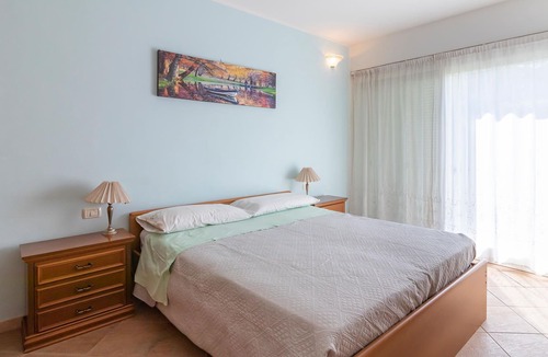 Arona Apartment | Attractive apartment on the first floor with private garden (table, chairs, deckchair and barbecue).