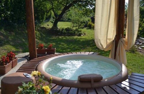 Rossana Apartment | Baita Naturas con piscina idromassaggio climatizzata, privata e gratuita