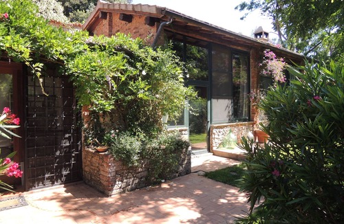 Porto Ercole House | Beautiful converted stone farmhouse set in a olive oil and wine producing estate
