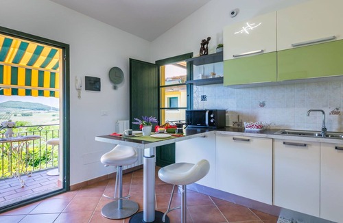 Castellina Marittima Apartment | Beautiful apartment for 2 guests with A/C, pool, WIFI, TV, balcony and pets allowed