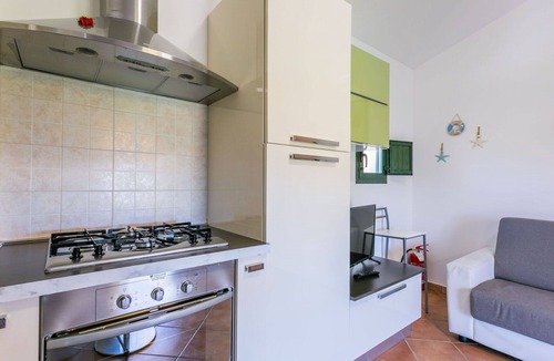 Castellina Marittima Apartment | Beautiful apartment for 2 guests with A/C, pool, WIFI, TV, balcony and pets allowed