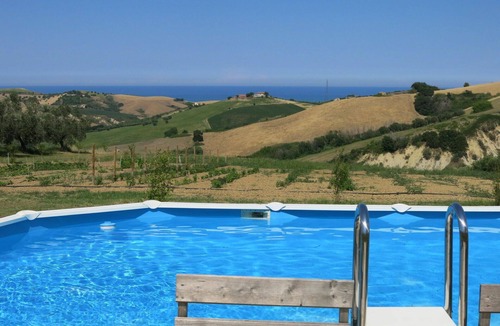 Cologna Spiaggia Villa | Beautiful apartment in villa with hot tub, pool, WIFI, A/C, TV, patio, pets allowed, panoramic view