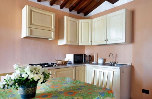 San Martino in Campo Apartment | Bright apartment of approximately 60 sqm, ideal for 4 people, located on the first floor of a building without an elevator.The property is located in a quiet and pleasant setting, with a large shared garden, a shared swimming pool, a BBQ area, and a rese