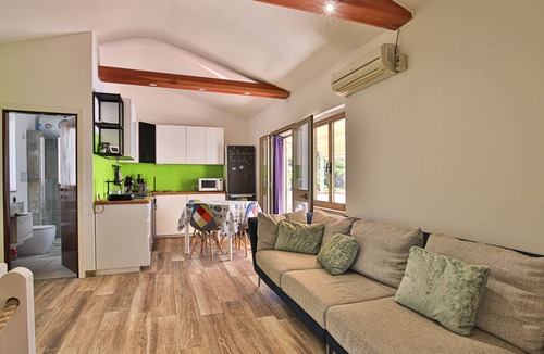 Seccheto Apartment | Camilla, a three-room apartment in Seccheto with a splendid sea view, a small balcony equipped with