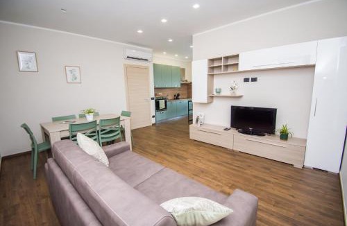Borgonovo Apartment | Casa Baratta - La Quercia, Neive, moderno appartamento, terrazzo vista Langhe, park EV