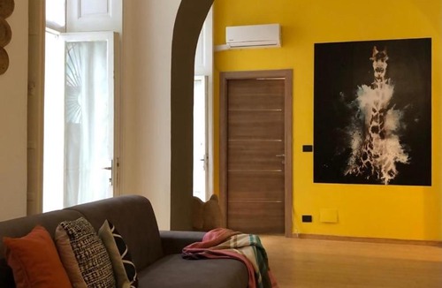 Roman Quarter Apartment | Casa vivace in centro Torino by Turin House Collection