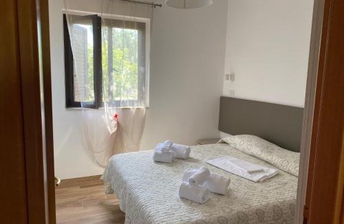 Chiesiola Apartment | Charming Apartment in Vieste with Shared Pool and Garden